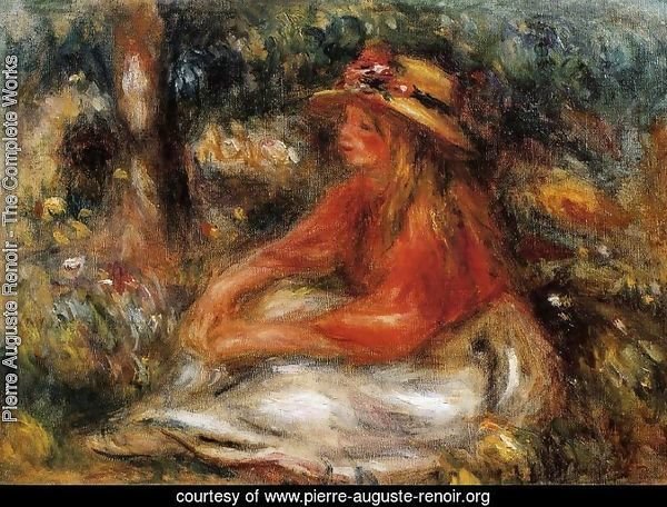 Young Woman Seated On The Grass
